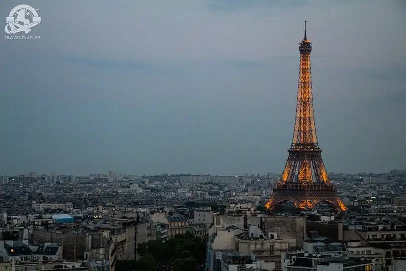 1. An Eiffel tower lit up in the evening