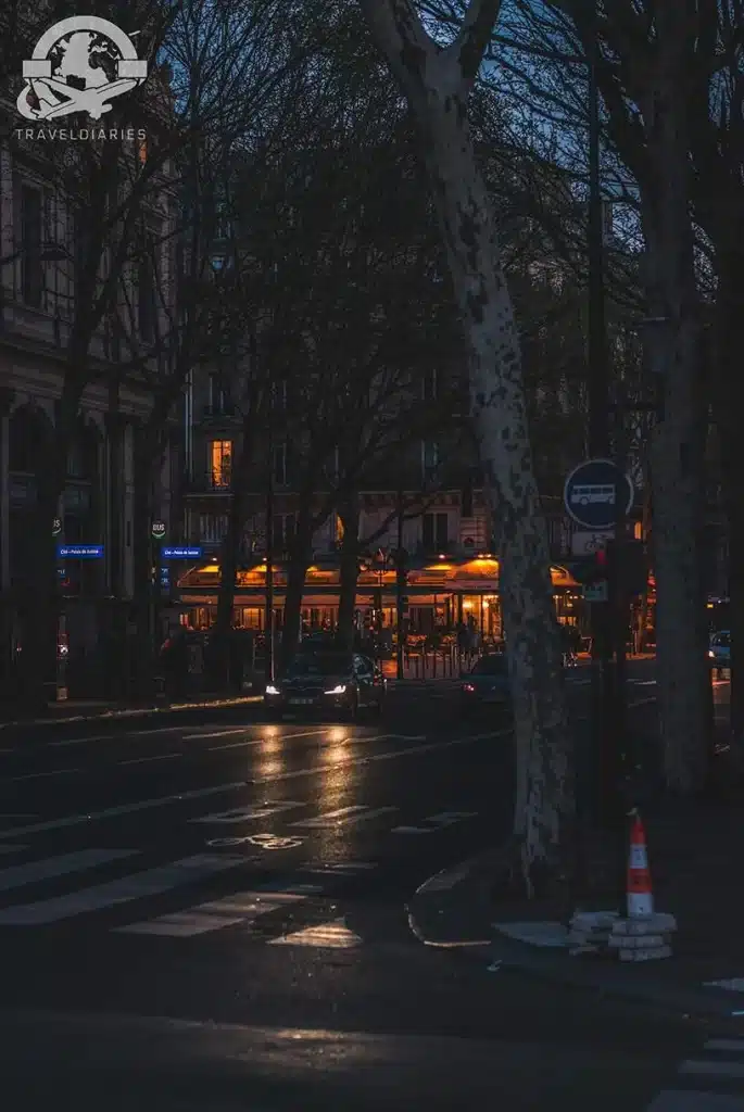 dark street and lights turned on Paris France