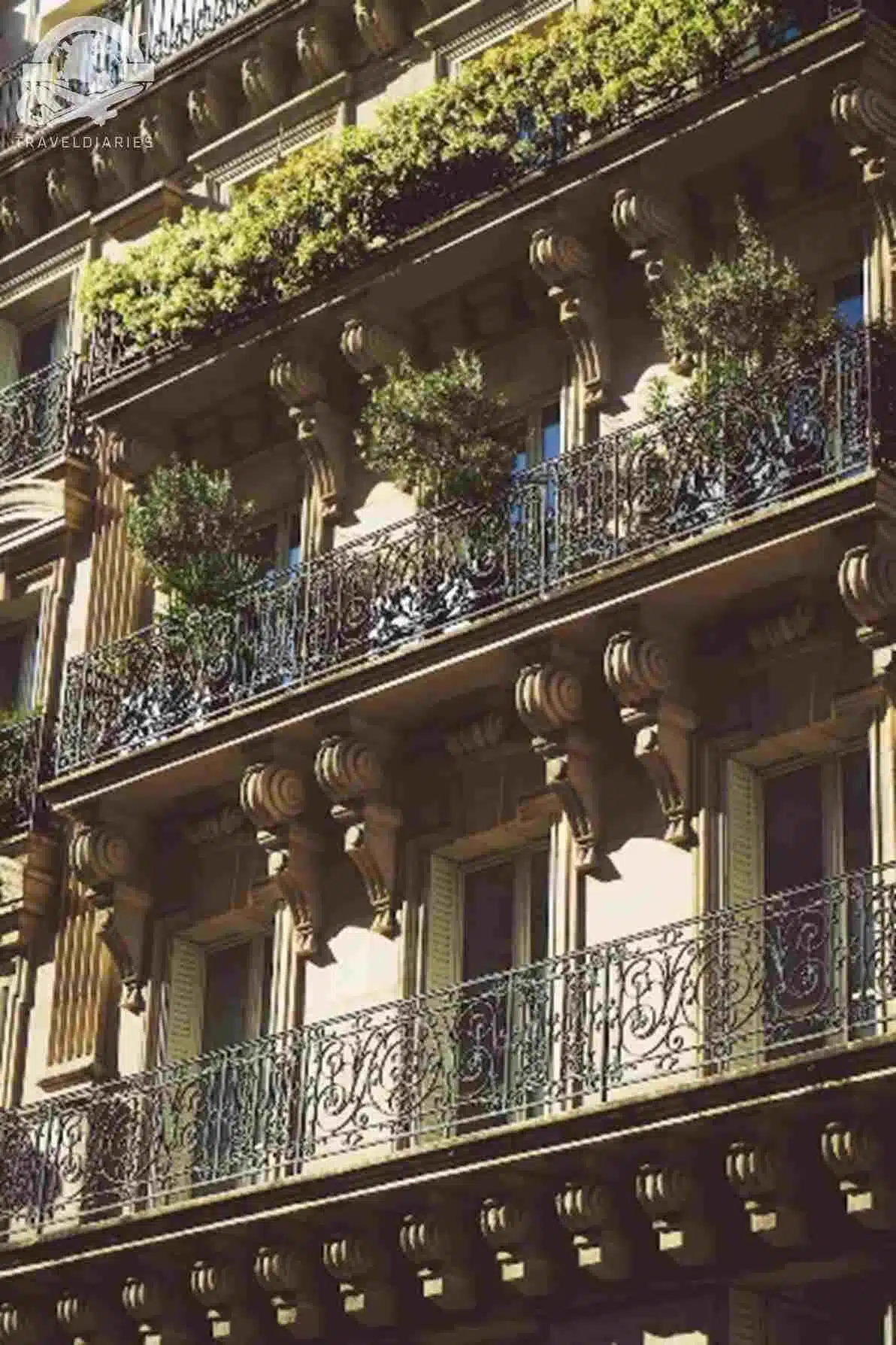 13. a tall building with balconies in 4th arrondissement- Paris, France