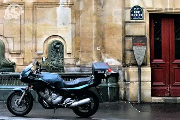 motorcycle parked on the street; Paris