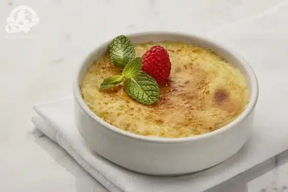 creme brulee with a raspberry and mint