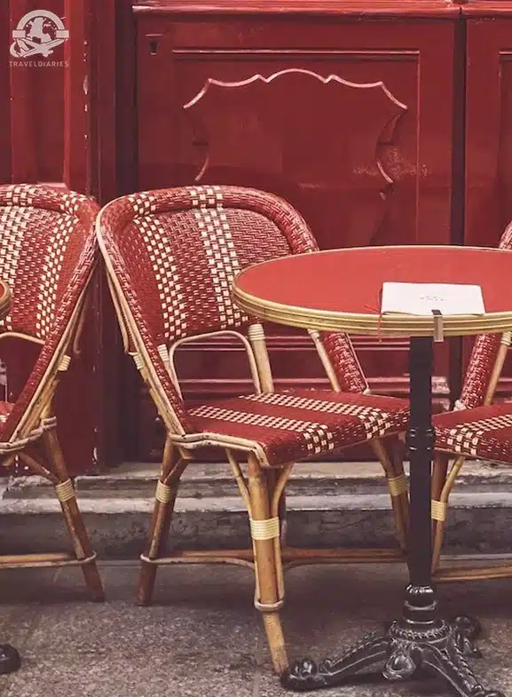 6. A table and chairs outside a restaurant; Paris, France