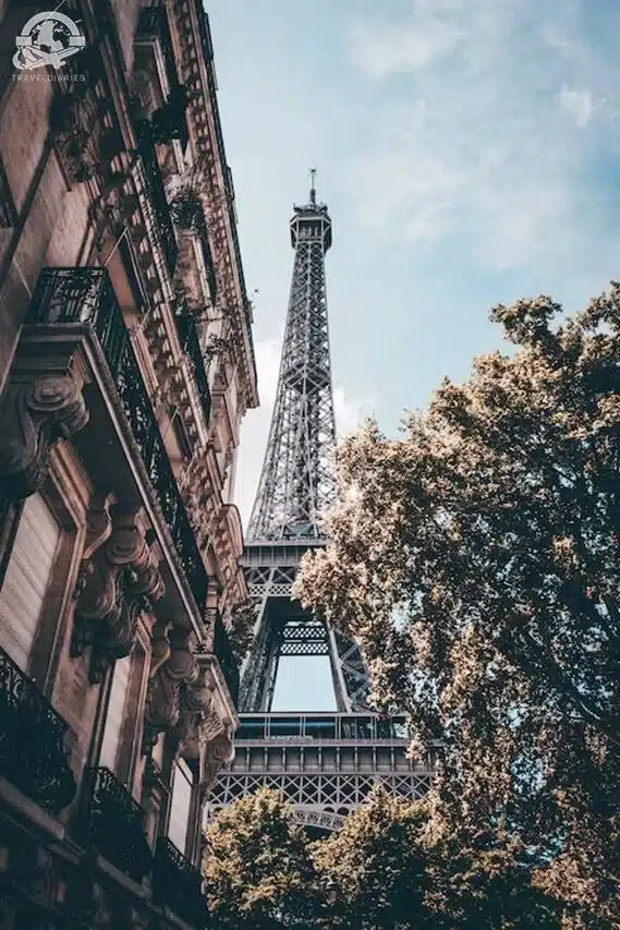 7. An Eiffel tower with trees in front of it; Paris, France